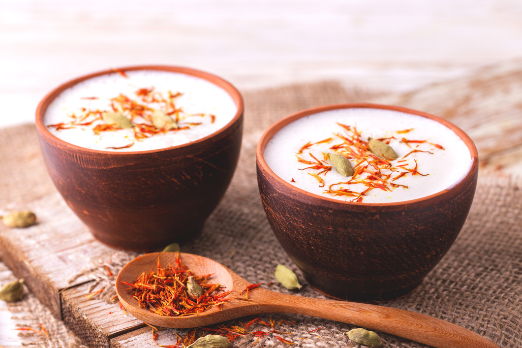 Traditional Indian lassi curd with cardamon and saffron.