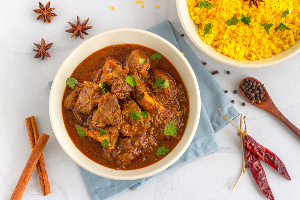 Lamb Curry / Lamb Vindaloo in a Bowl on White Background