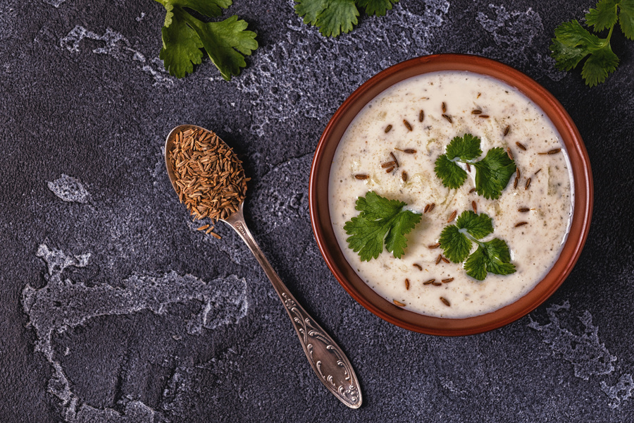 Traditional Indian Raita with cucumber, cumin, coriander.